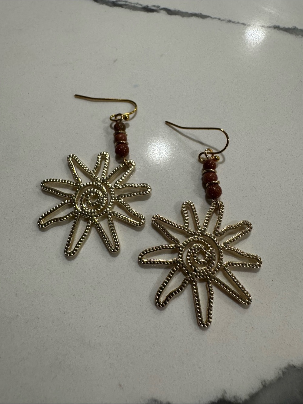 Gold Sunburst Drop Earrings with Brown Bead Accents